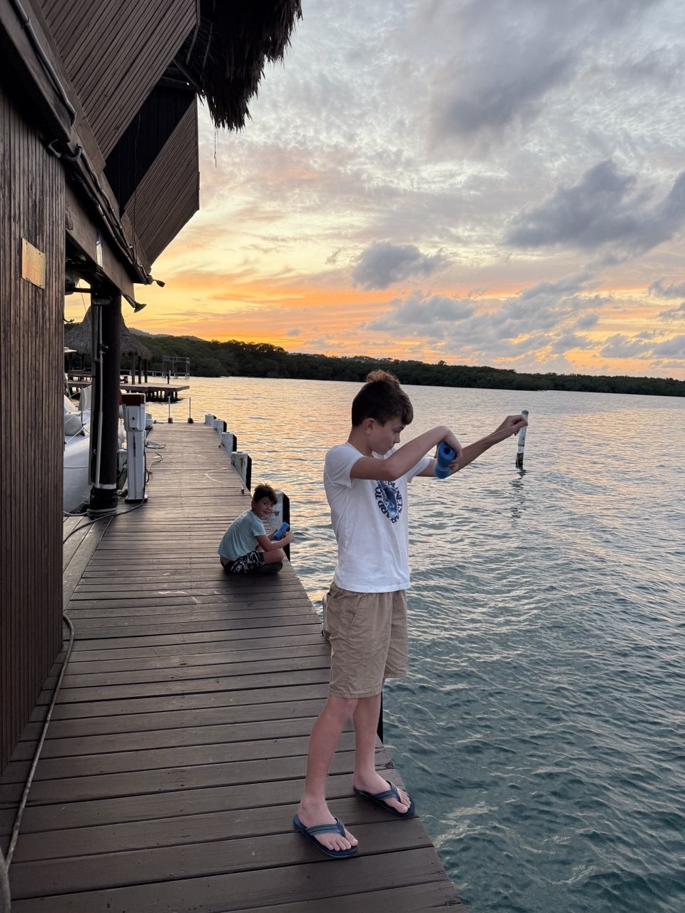 Hand fishing from the VRBO dock in Roatan