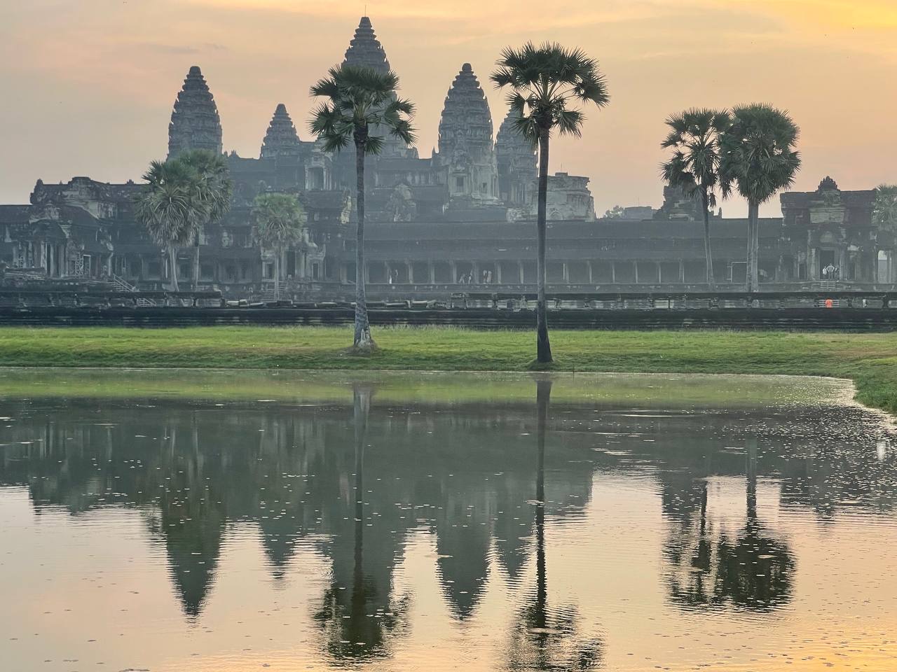 The iconic reflection of Angkor Wat at sunrise
