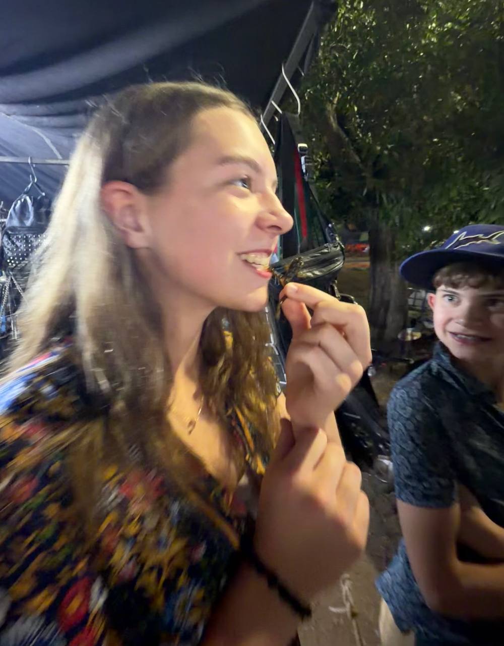 Trying a bug (Caleb watching)